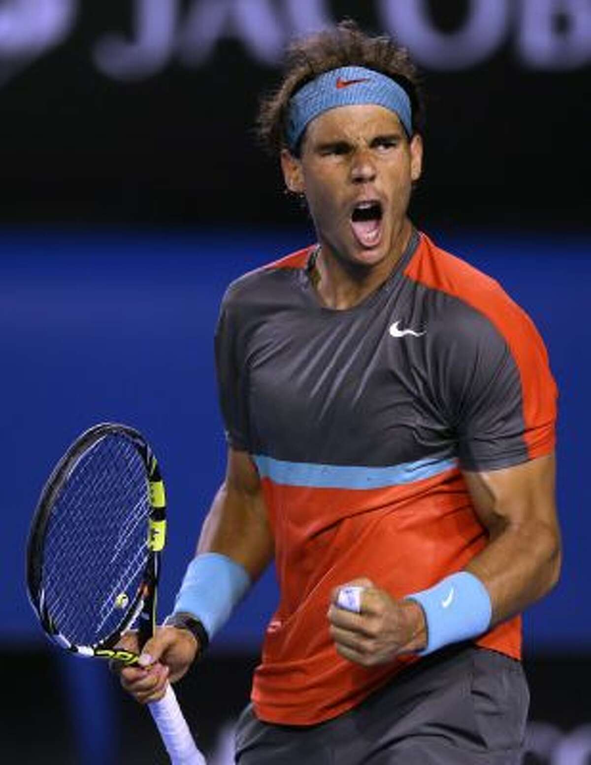 Rafael Nadal celebrates the first set point won against Roger Federer.
