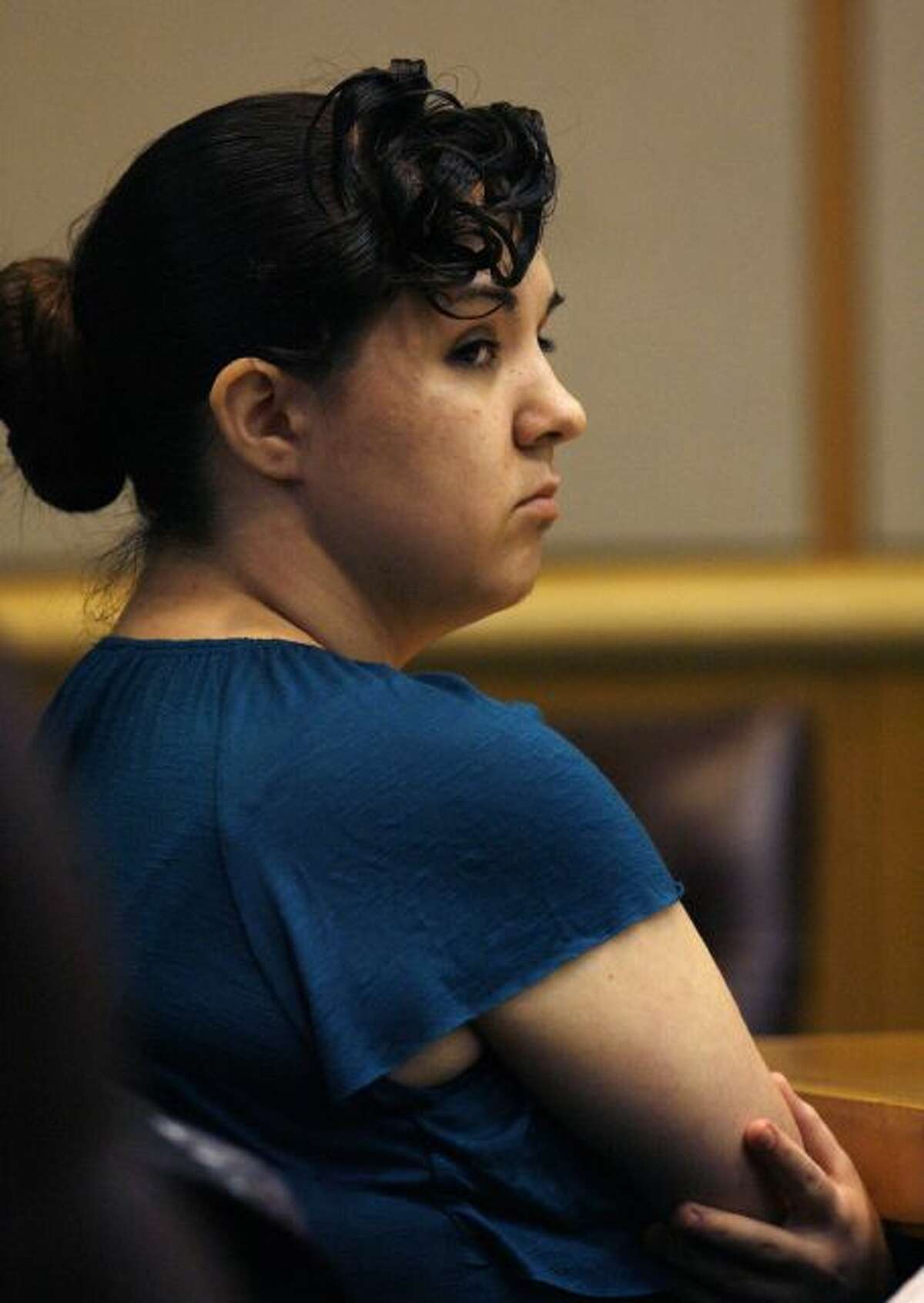 Defendant Jennifer Mee watches members of the jury during her trial on Friday, Sept. 20, 2013, 2013. Mee and two men are charged in the death of Shannon Griffin, a 22-year-old Wal-Mart worker. Prosecutors say Mee lured Griffin to a St. Petersburg home under the pretense of buying marijuana, but instead, two of Mee's friends robbed him at gunpoint. Griffin struggled with the suspects and was shot several times. Mee gained fame because of her uncontrolled hiccupping as a teenager . Videos of her hiccupping gained her national attention, as did her attempts to quell the problem. (AP Photo/The Tampa Bay Times, Scott Keeler, Pool)