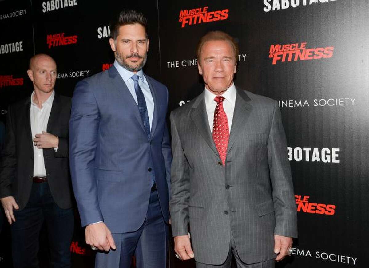 In this Tuesday, March 25, 2014 file photo, actors Joe Manganiello, left, and Arnold Schwarzenegger attend a special screening of Open Road Films' "Sabotage," hosted by The Cinema Society with Muscle & Fitness at AMC Lincoln Square, in New York. The film releases Friday, March 28, 2014. (Photo by Evan Agostini/Invision/AP)