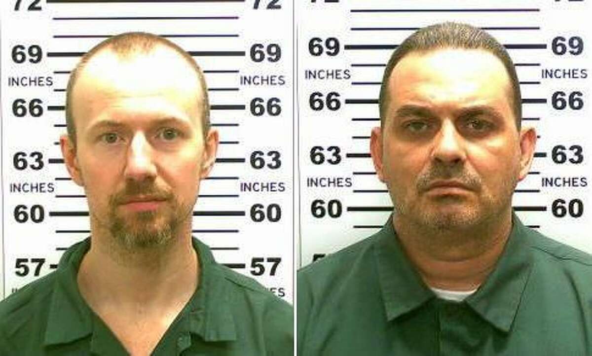 FILE - At left, in a May 21, 2015, file photo released by the New York State Police is David Sweat. At right, in a May 20, 2015, file photo released by the New York State Police is Richard Matt. New York State Police are investigating a possible sighting of the two convicted killers who escaped from an upstate New York prison two weeks ago. In a news release posted late Friday, June 19, 2015, State Police say two men fitting the description of inmates David Sweat and Richard Matt were seen a week ago in Steuben County, New York, over 300 miles southwest of the prison in Dannemora. (New York State Police via AP, File)