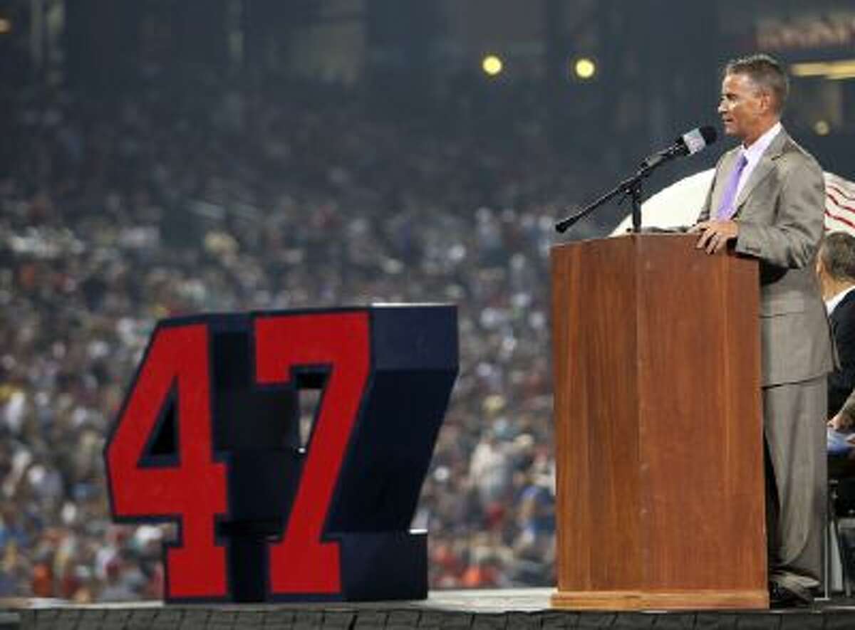 Tom Glavine speaks at Turner Field after his number was retired by the Atlanta Braves on Aug. 6, 2010.