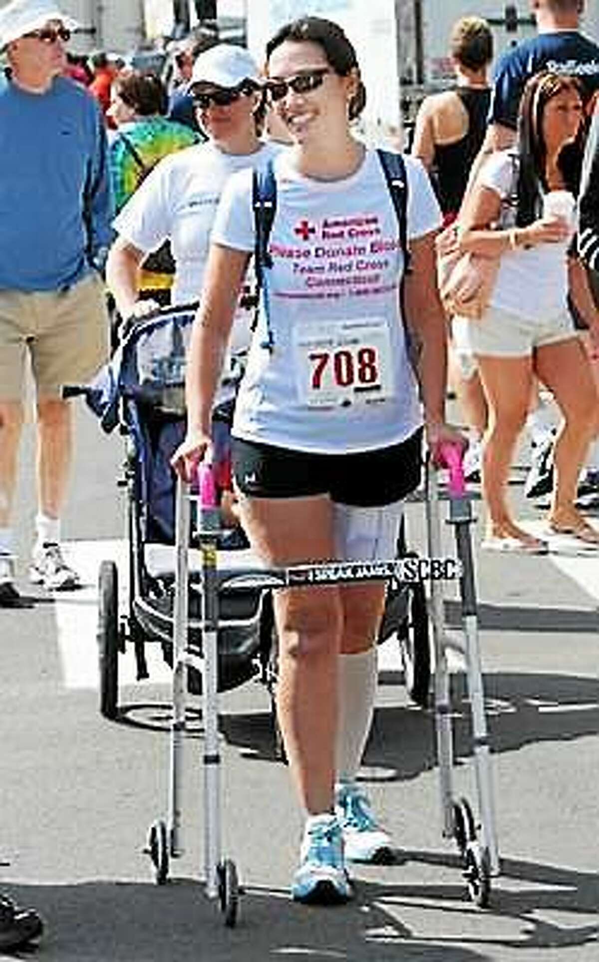 (File photo) Colleen Kelly Alexander of Clinton takes part in the 32nd Annual Branford Road Race in 2012.