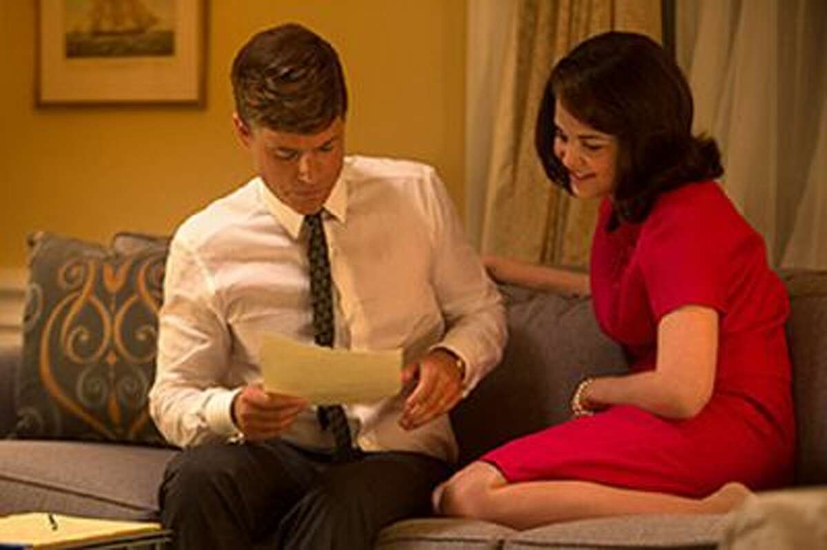 President John F. Kennedy (Rob Lowe) and Jackie (Ginnifer Goodwin) share a moment in the White House in KILLING KENNEDY, premiering on the National Geographic Channel this November.