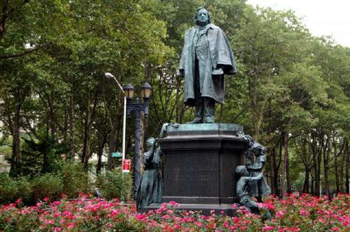 John Quincy Adams Ward's 1890 statue of Henry Ward Beecher stands at the north end of Columbus Park in New York.