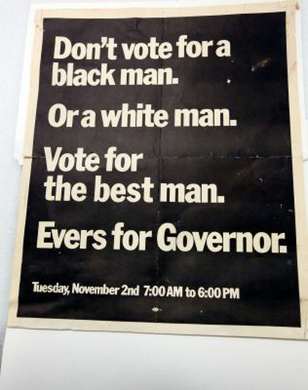 In this Oct. 11, 2013 photograph, items like this poster used by former Fayette, Miss., Mayor Charles Evers, brother of slain civil rights leader Medgar Evers, during his campaign for governor, will eventually be displayed in the state civil rights museum in Jackson, Miss.