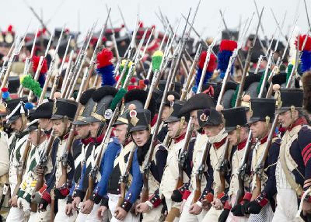 Troops march during the reconstruction of the Battle of the Nations at the 200th anniversary near Leipzig, central Germany, Sunday, Oct. 20, 2013.