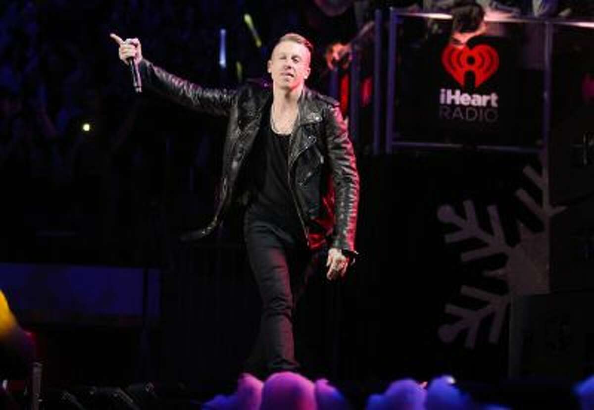 Macklemore performs at Z100?s Jingle Ball 2013, presented by Aéropostale, at Madison Square Garden on Friday, Dec. 13, 2013 in New York.