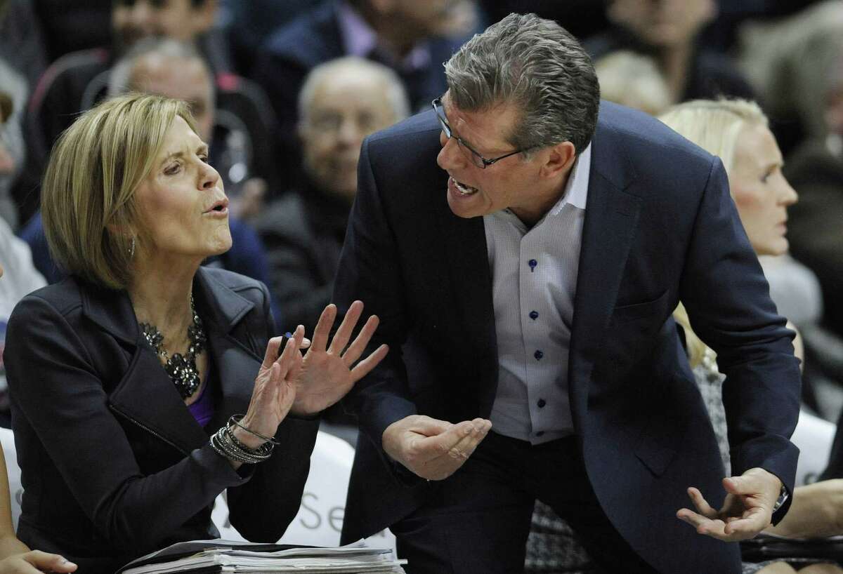 UConn associate head coach Chris Dailey and head coach Geno Auriemma have been together for 11 national titles.