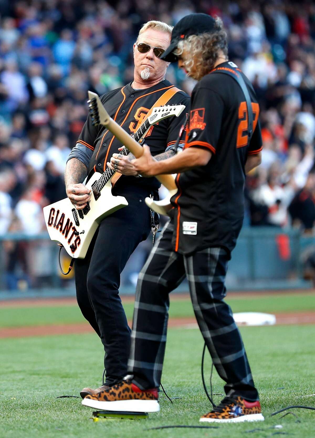 Metallica's James Hatfield and Kirk Hammett perform National Anthem before San Francisco Giants play Chicago Cubs during MLB game at AT&T Park in San Francisco, Calif. on Monday, August 7, 2017.
