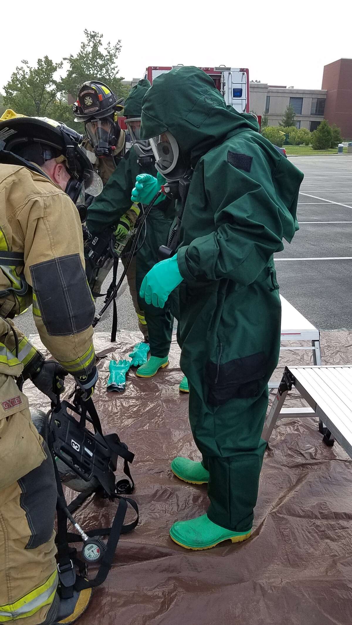 Public safety officials had to suit up while participating in Monday's chemical contamination simulation at SIUE's science building.