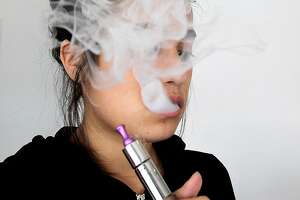 The U.S. surgeon general has a new report on electronic cigarettes that focuses on the risks for teens and young adults. (Luis Sinco/Los Angeles Times/TNS)