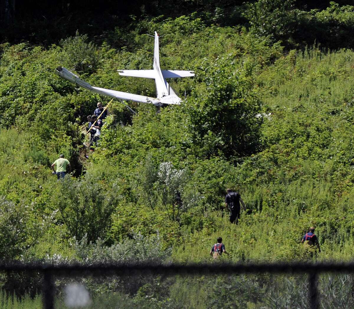 Three people are injured after a plane crashed about a mile from Danbury Airport Sunday morning, police confirmed. The crash occured off Miry Brook Road near the Dog Park around 10:30 a.m, July 30, 2017