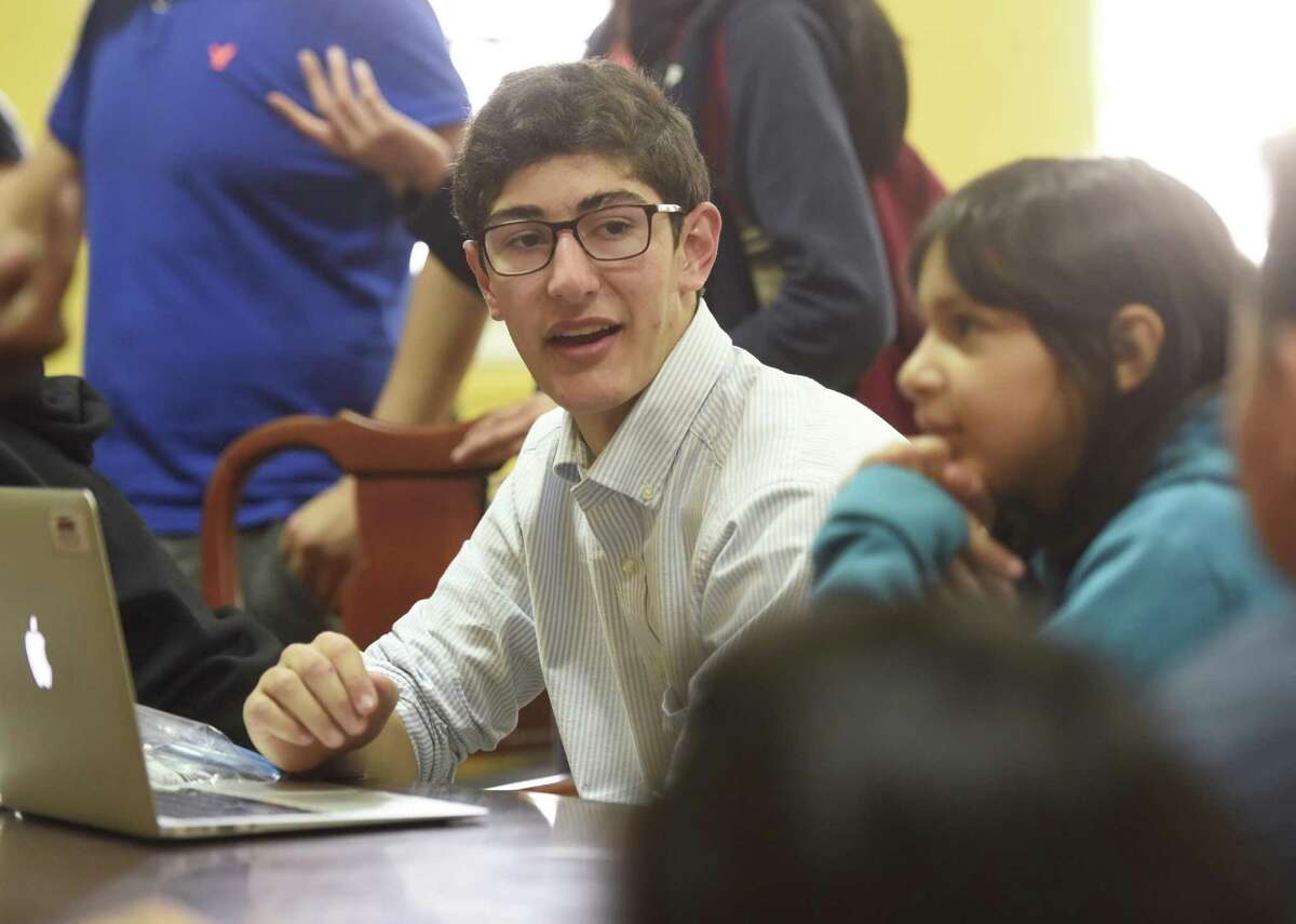 Brunswick School senior Oliver Nusbaum taught the student-led Latin Club at the Don Bosco Community Center in Port Chester, N.Y. Wednesday, April 20, 2016. Nusbaum also taught Latin to Horizons at Brunswick students in summer 2017.