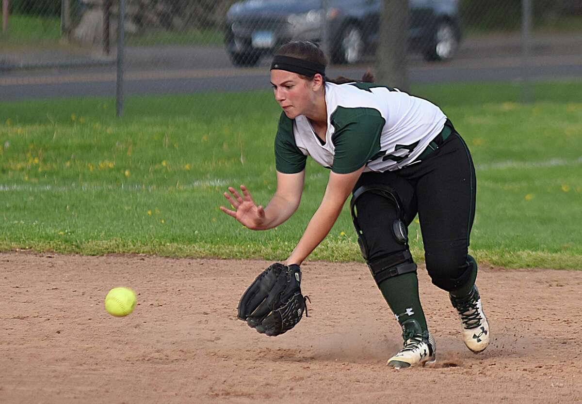 Norwalk shortstop Katie Sciglimpaglia gets ready to scoop up a ground ball during a May 1 FCIAC softball game against New Canaan at Ray Barry Field in Norwalk. New Canaan topped the host Bears 9-5.