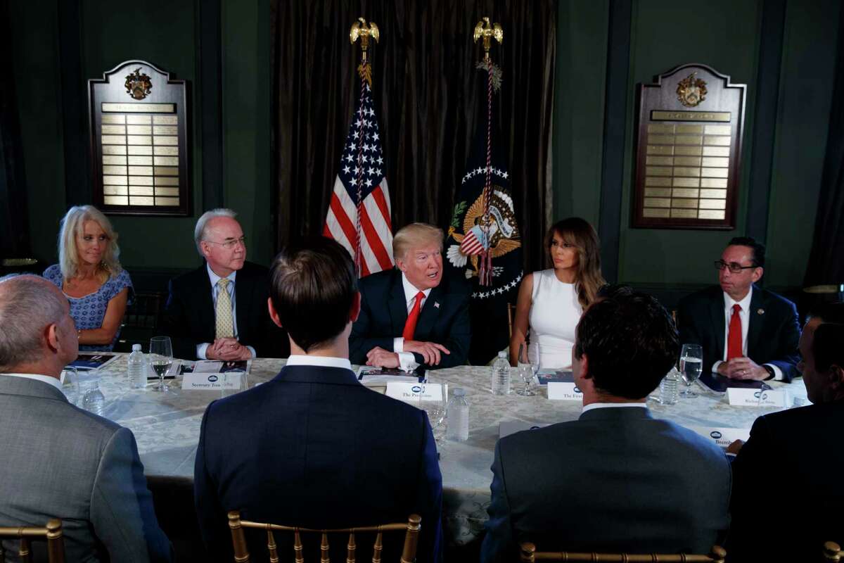 President Donald Trump speaks during a briefing on the opioid crisis, Tuesday, Aug. 8, 2017, at Trump National Golf Club in Bedminster, N.J. From left are, White House senior adviser Kellyanne Conway, Health and Human Services Secretary Tom Price, Trump, first lady Melania Trump, and National Drug Control Policy acting Director Richard Baum. (AP Photo/Evan Vucci) ORG XMIT: NJEV105