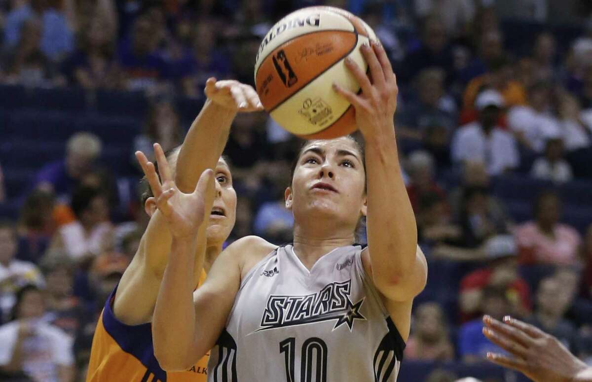Stars’ Kelsey Plum scores against the Mercury’s Diana Turasi at Talking Stick Resort Arena in Phoenix on July 30, 2017.