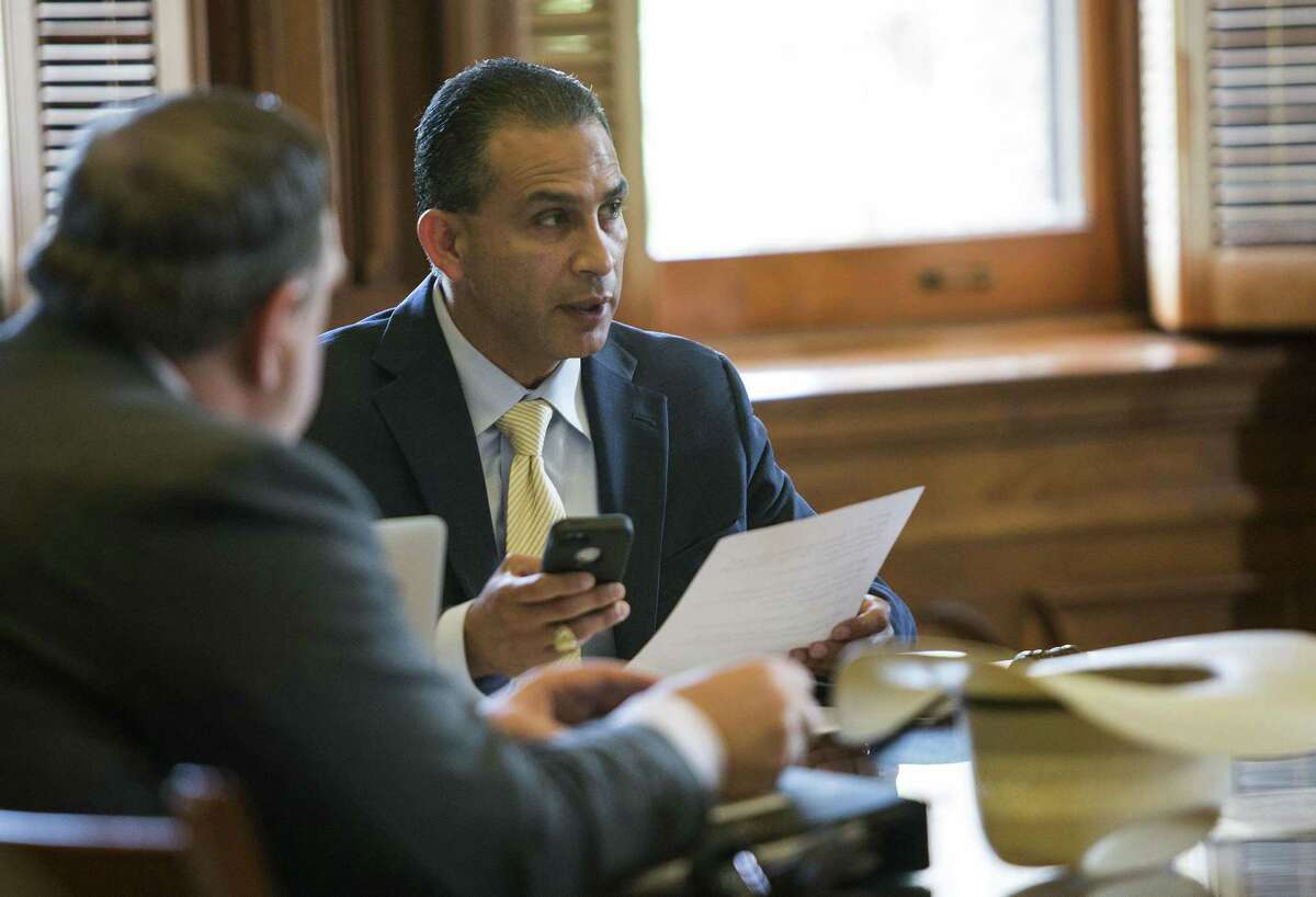 Rep. Abel Herrero, D-Corpus Christi, chair of the Land and Resource Management committee, reads aloud a bill during the committee hearing that revived the annexation legislation last week. The measure went on to make it through the full House and on Sunday, the Senate concurred with House amendments, sending the bill to Gov. Greg Abbott.