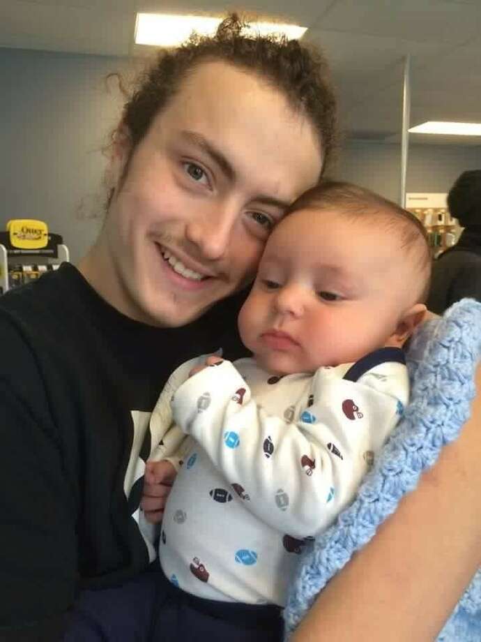 David Feliciano, left, poses in an undated photo with his nephew Carter.