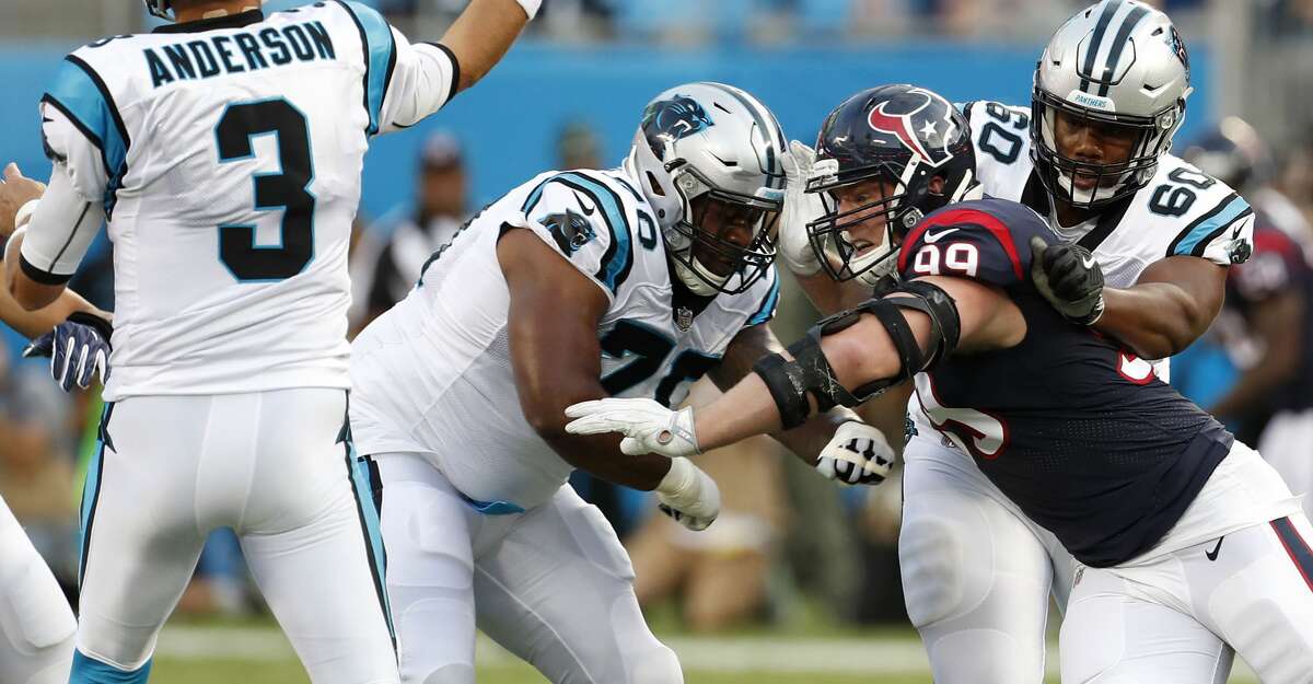 Houston Texans defensive end J.J. Watt (99) rushes Carolina Panthers quarterback Derek Anderson (3) during the first half of an NFL pre-season football game at Bank of America Stadium on Wednesday, Aug. 9, 2017, in Charlotte. ( Brett Coomer / Houston Chronicle )