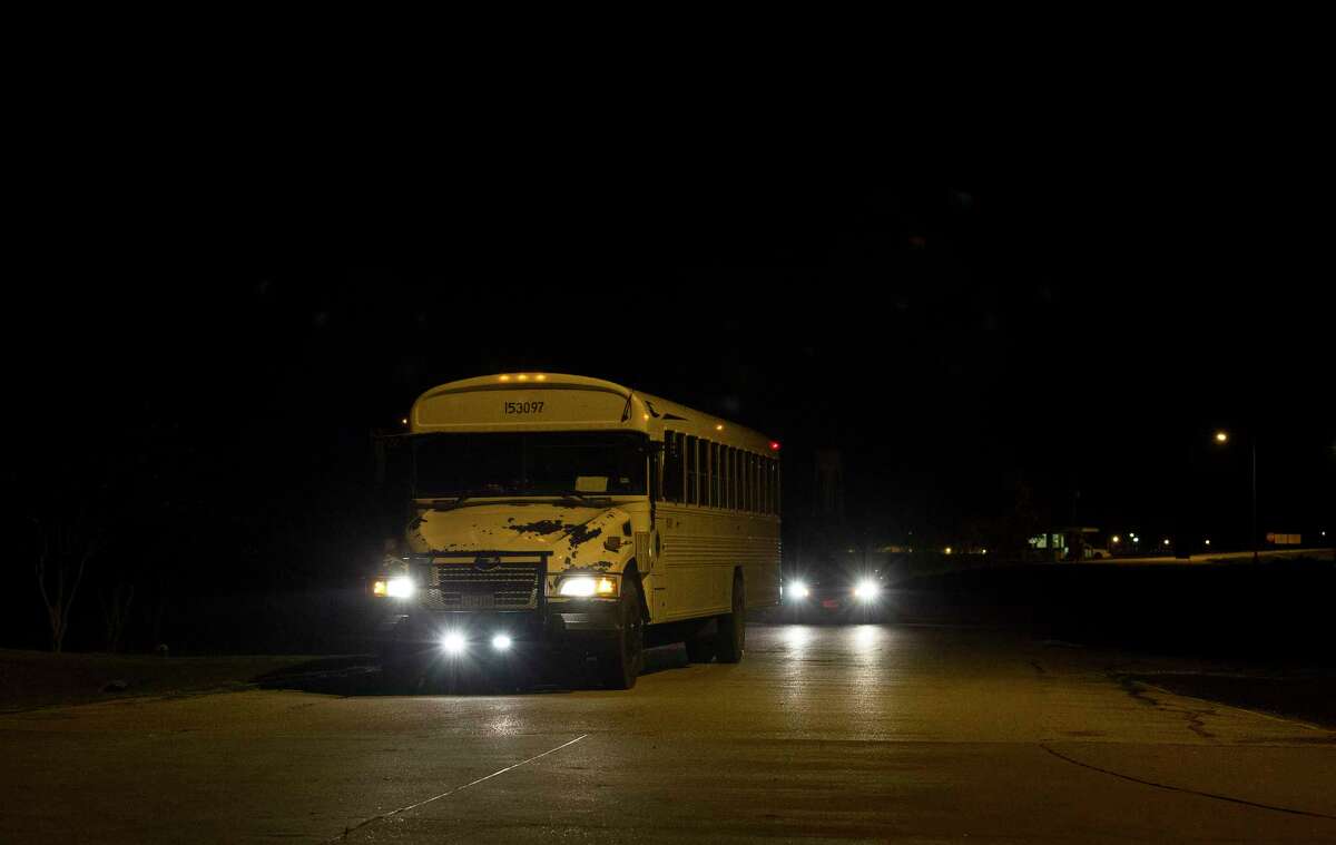 The first bus to transfer heat-sensitive inmates left the Pack Unit around 5 a.m. Wednesday.