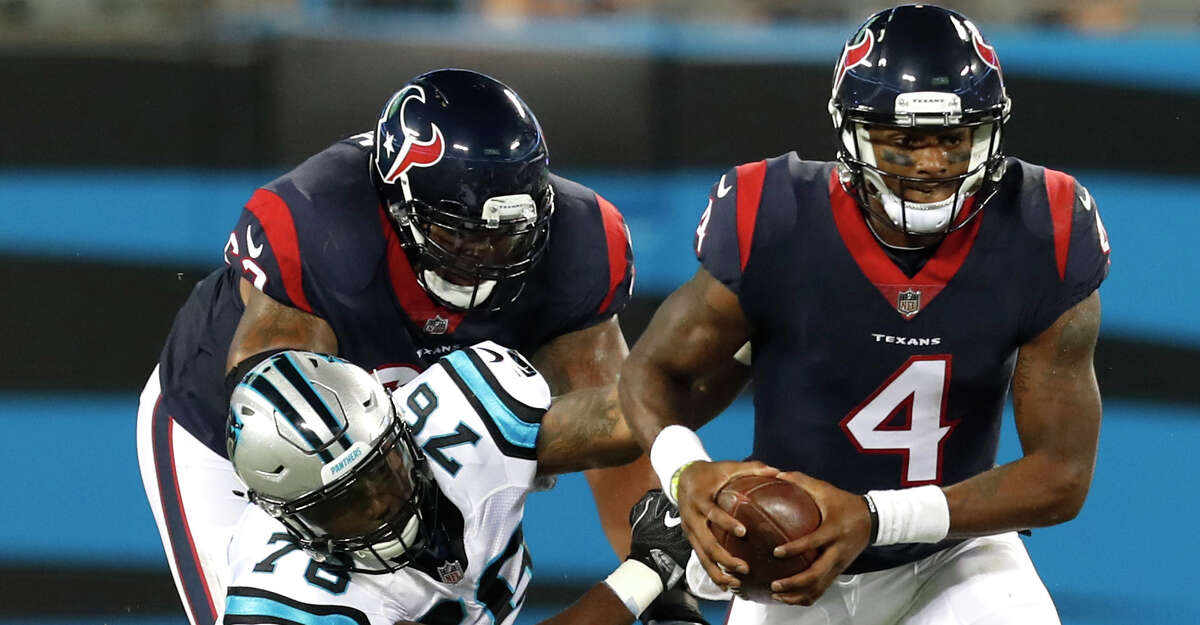 Houston Texans quarterback Deshaun Watson (4) avoids a sack as he breaks away from Carolina Panthers offensive tackle Blaine Clausell (76) during the third quarter of an NFL pre-season football game at Bank of America Stadium on Wednesday, Aug. 9, 2017, in Charlotte. ( Brett Coomer / Houston Chronicle )