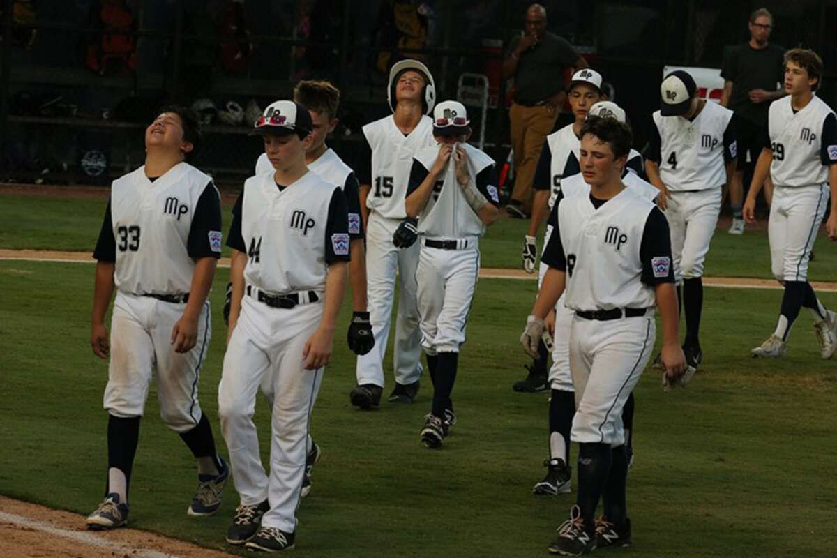McAllister Park players are dejected as they walk off the field after losing to Lufkin on Wednesday night in Waco.