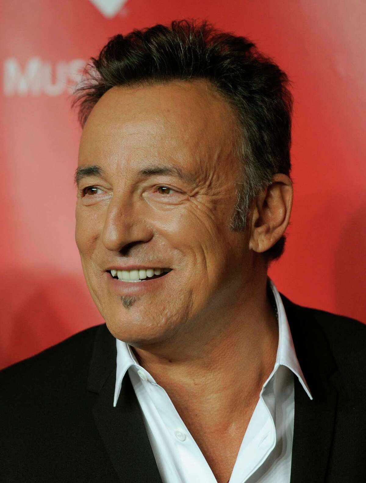 Honoree Bruce Springsteen arrives at his MusiCares Person of the Year tribute at the Los Angeles Convention Center on Friday Feb. 8, 2013, in Los Angeles. (Photo by Chris Pizzello/Invision/AP)