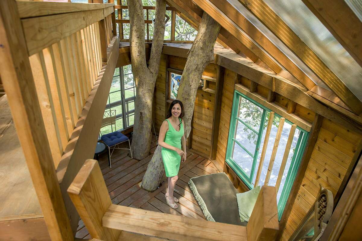 Puneet Sandhu's checks the second floor of her treehouse on Saturday, Aug. 5, 2017, in San Jose, Calif. The second floor has two bedrooms. One for her and the other for her children.