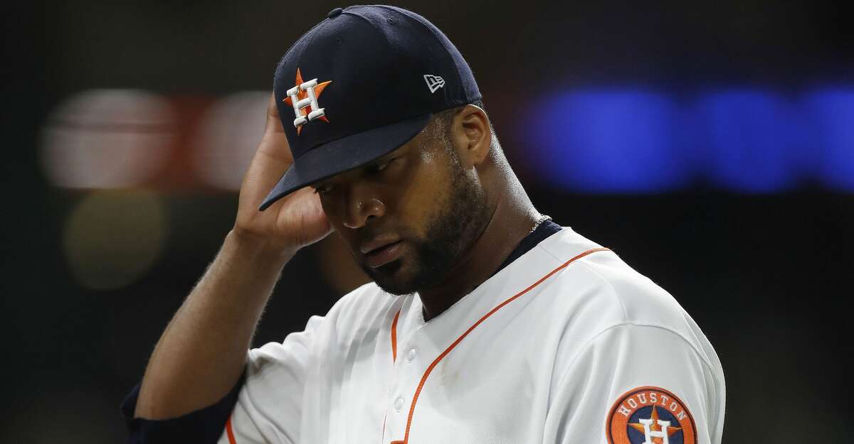 Houston Astros relief pitcher Francisco Liriano (35) walks back to the dugout after getting pulled after facing three batters during the seventh inning of an MLB game at Minute Maid Park, Thursday, Aug. 3, 2017, in Houston. ( Karen Warren / Houston Chronicle )