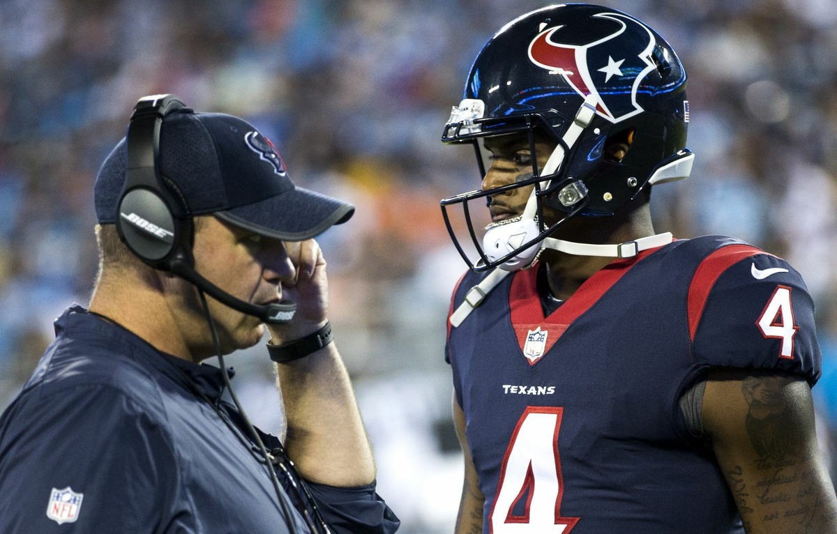 Houston Texans quarterback Deshaun Watson (4) walks past Texans head coach Bill O'Brien during the first half of an NFL pre-season football game against the Carolina Panthers at Bank of America Stadium on Wednesday, Aug. 9, 2017, in Charlotte. ( Brett Coomer / Houston Chronicle )