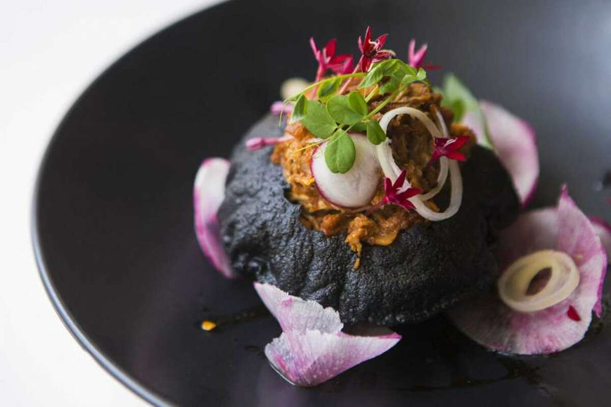 Xochi, an Oaxacan inspired restaurant in downtown Houston, is a 2018 James Beard Award semifinalist for Best New Restaurant. Shown: Infladita de Conejo at Xochi. 