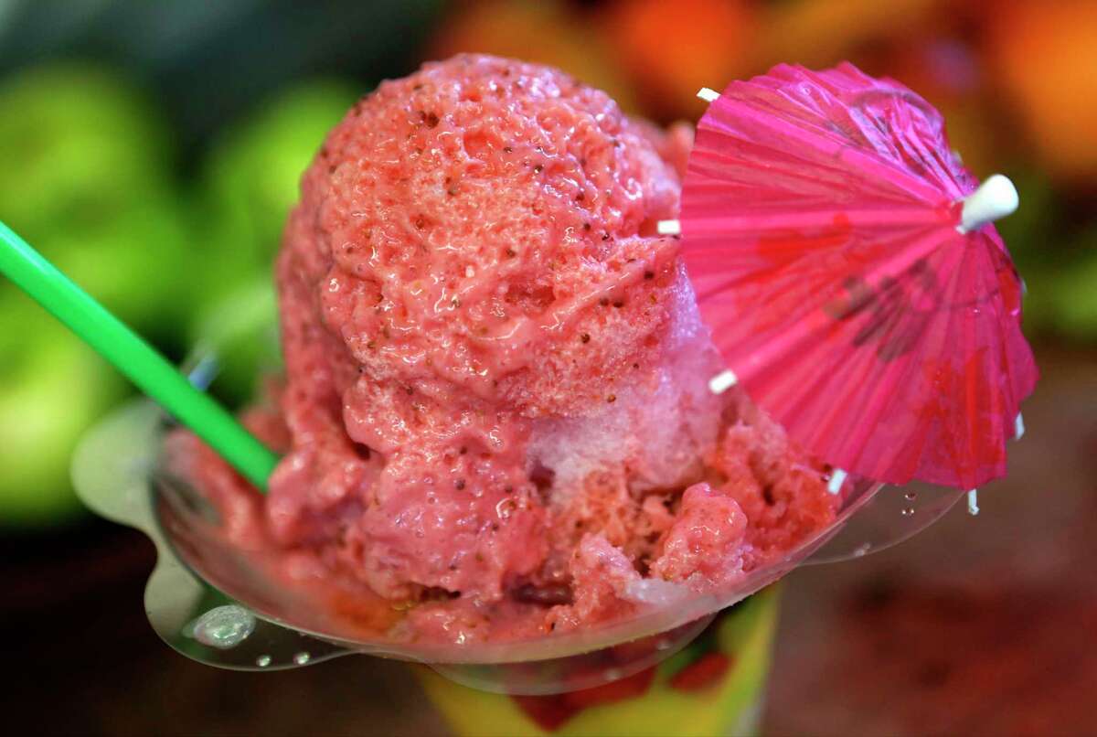 A Pink Lady Supreme raspa exemplifies the creativity that Chamoy City Limits brings to frozen treats.