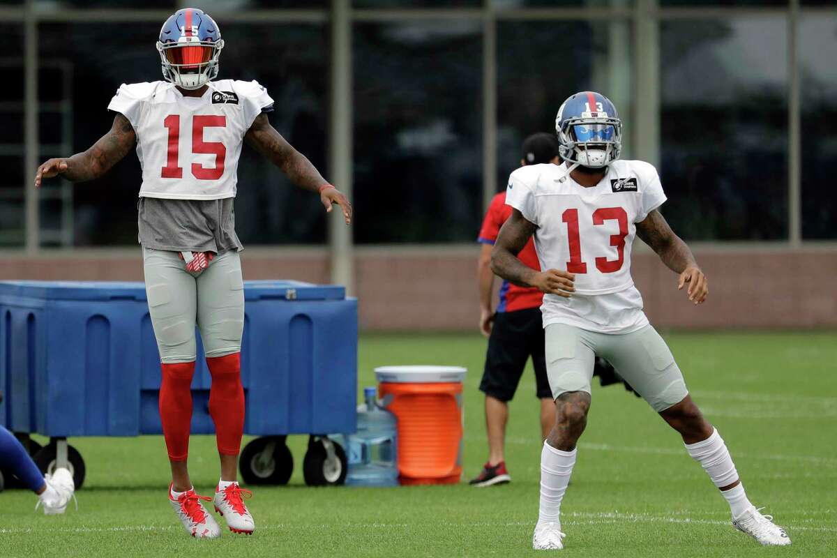 Odell Beckham Jr. catches passes from Eli Manning at Manning Camp 