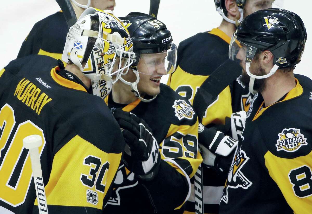 Pittsburgh Penguins left wing Scott Wilson (23) skates against the