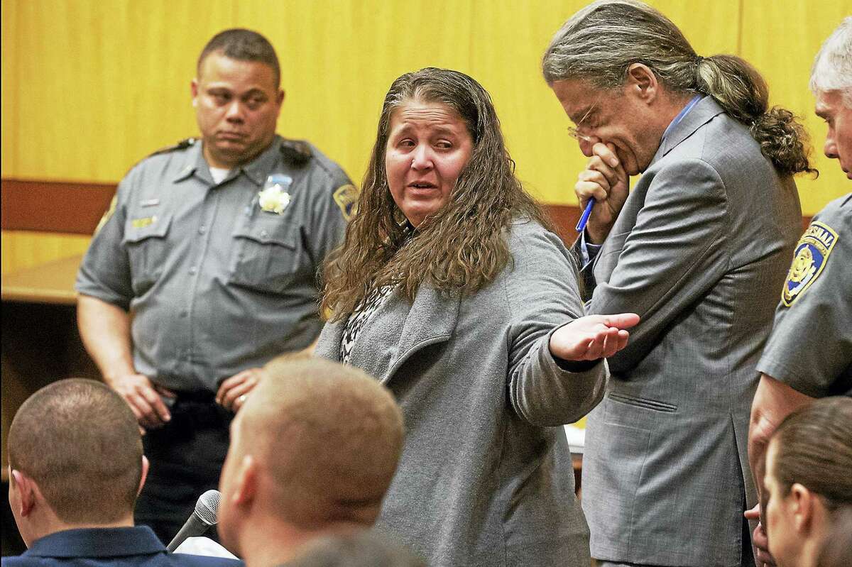 PATRICK RAYCRAFT/COURANT VIA AP POOL Denise Moreno, the mother of Tony Moreno, cries after speaking on her son’s behalf. He was sentenced to 70 years in prison for the murder and risk of injury to his child.