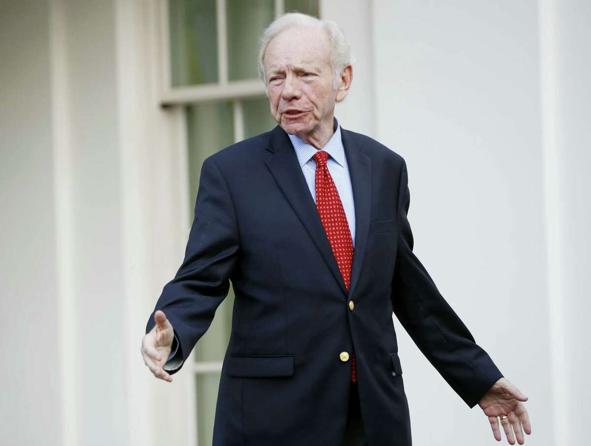 Former Connecticut Sen. Joe Lieberman leaves the West Wing of the White House in Washington, Wednesday, May 17.