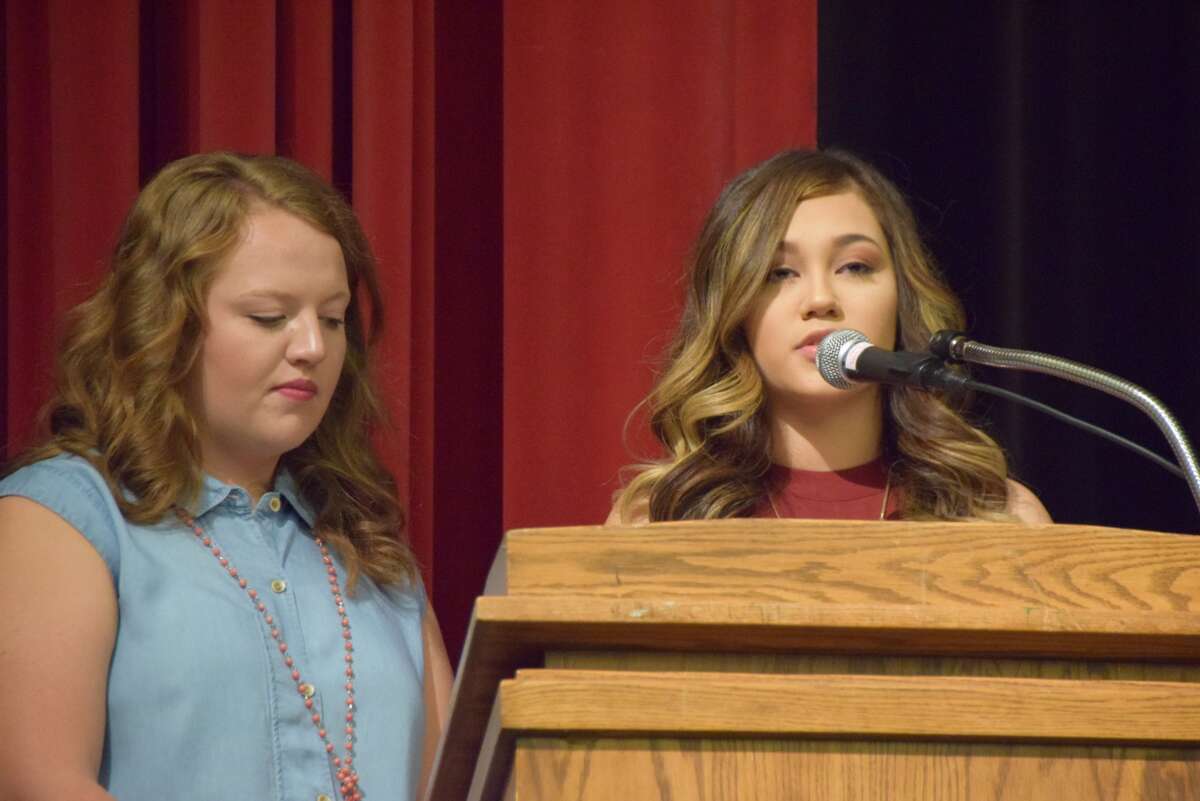 Plainview High School students Sawyer Tirey (left) and Tabbatha Riojas share the duties of mistress of ceremonies for the Plainview ISD 2017 Convocation on Friday morning.