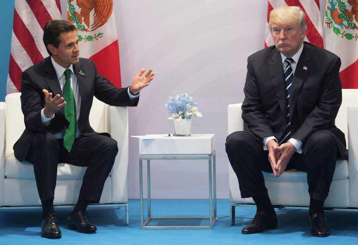 President Donald Trump and Mexican President Enrique Peña Nieto holding a meeting on the sidelines of the G20 Summit in Hamburg, Germany on April 7. In a phone call months earlier, Donald Trump pressed Mexican President Enrique Peña Nieto to stop saying publicly that Mexico would not pay for his promised border wall, according to a transcript of their January conversation obtained by The Washington Post.