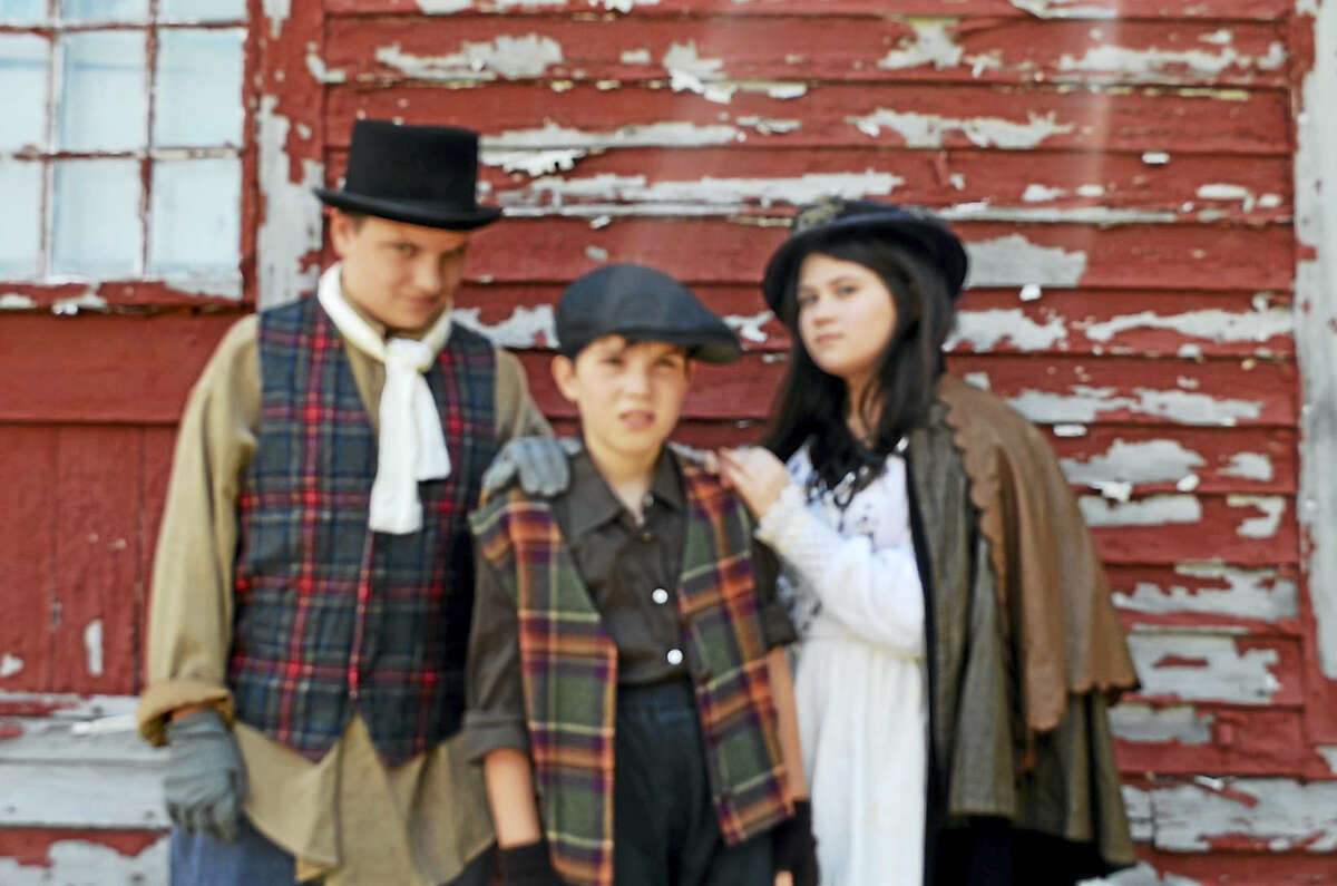 Above, from left, are Will Curry (Clinton) as Fagin; Gabriella Onorati (Madison) as Nancy and Matthew Law (Guilford) playing a hapless orphan. Not pictured: Brayden Esler (Clinton) as Oliver and Isabelle Schreiner (Madison) as the Artful Dodger.