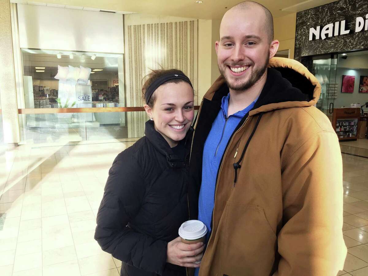 Courtney Taylor and her boyfriend, Zach Tobias, pose for a portrait at a mall in Whitehall, Pennsylvania, on Feb. 9, 2017. Taylor and Tobias don’t mix shopping with politics, but say it seems to be happening more often during the Donald Trump era as activists who either oppose or support the president target stores and brands for boycotts.