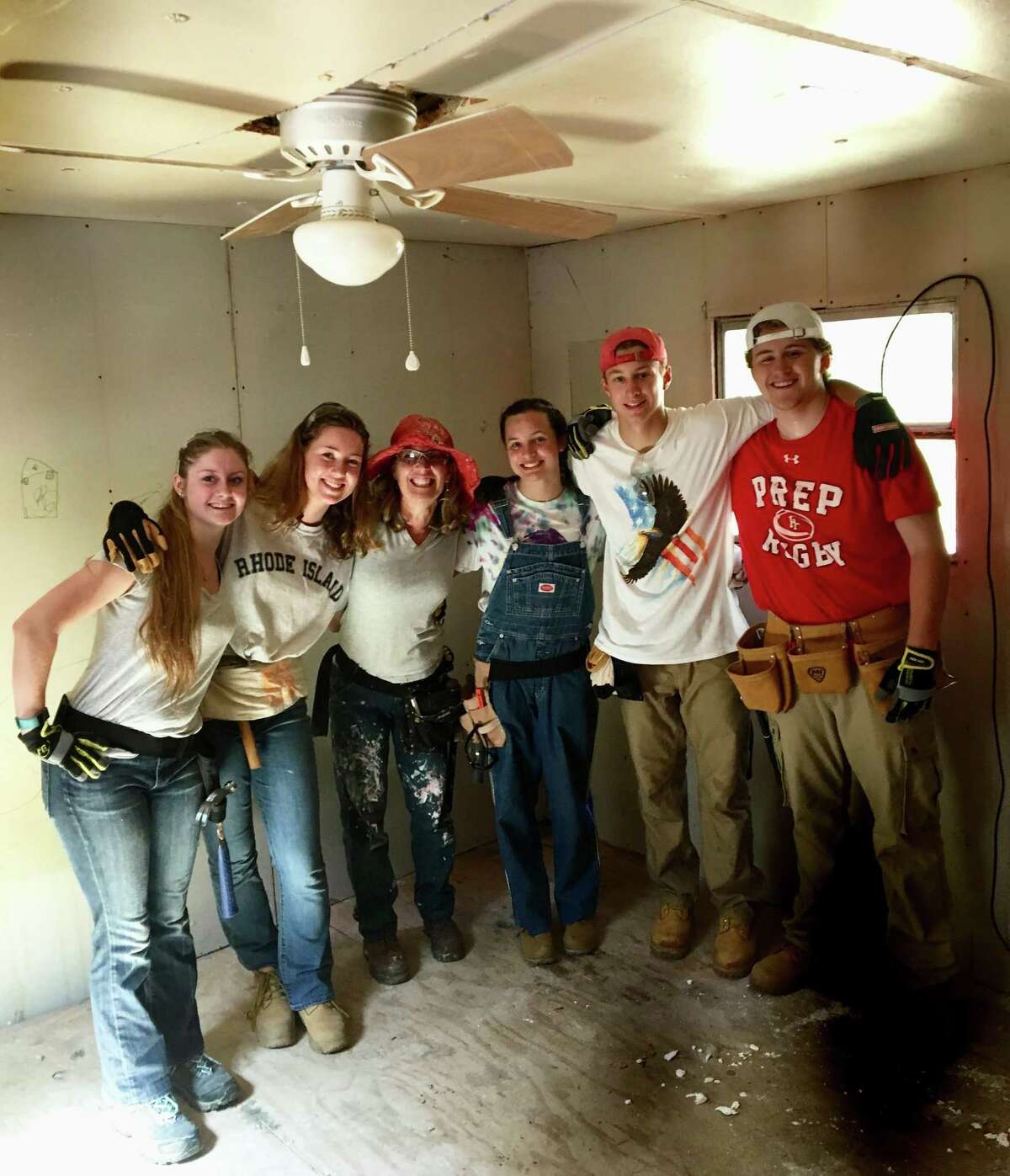Cindi Bigelow and members of her Appalachia Service Project team working in West Virginia, from left, Grace Hoden, Megan Murphy, Bigelow, Lily Kernaghan, Charlie Richard and Sean Fuller.