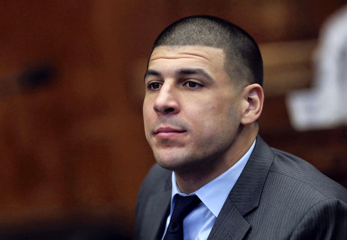 Angela Rowlings/The Boston Herald via AP, Pool, File In this Dec. 20, 2016 photo, Former New England Patriots NFL football player Aaron Hernandez appears during a hearing at Suffolk Superior Court in Boston. Hernandez is due in court Thursday, Jan. 19, 2017, when a judge is expected to hear arguments on defense motions.