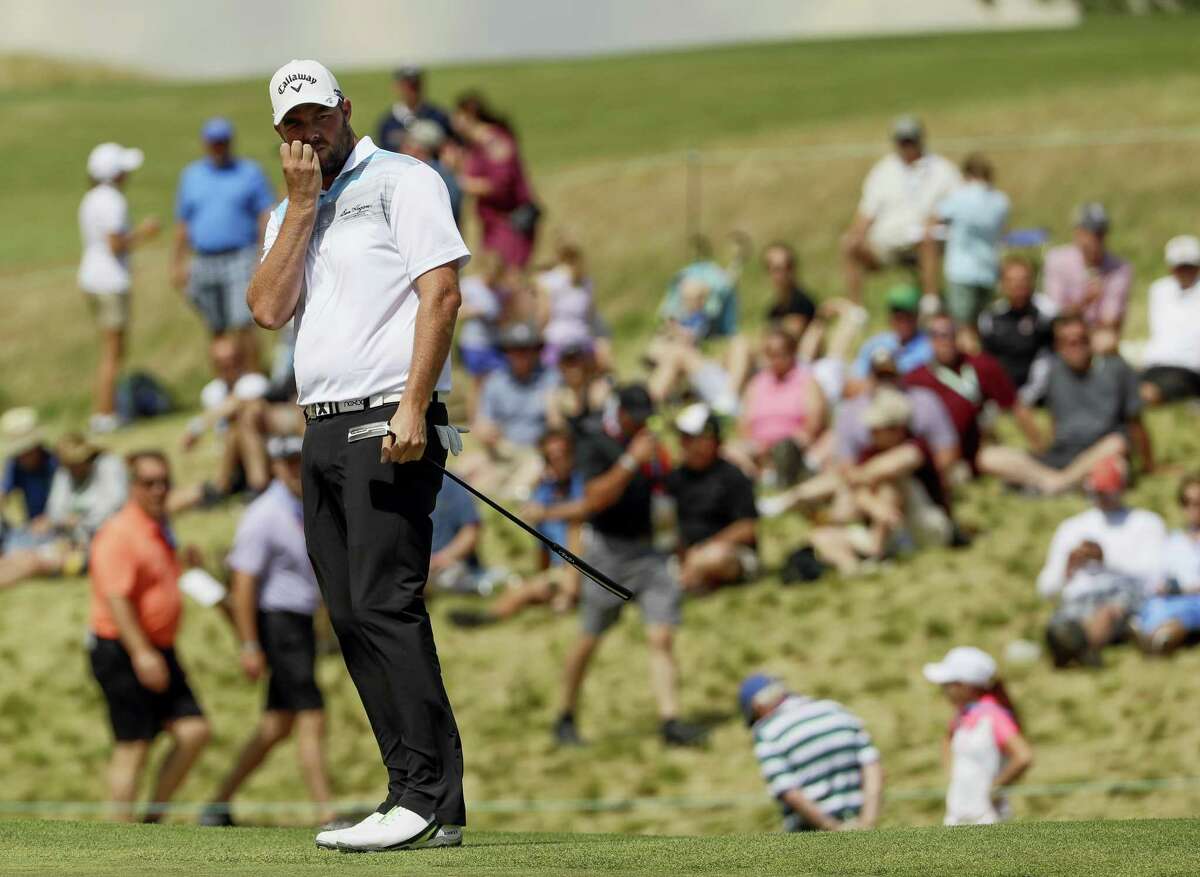 Marc Leishman, of Australia, watches his putt on the ninth hole during the fourth round of the U.S. Open golf tournament Sunday at Erin Hills in Erin, Wis.