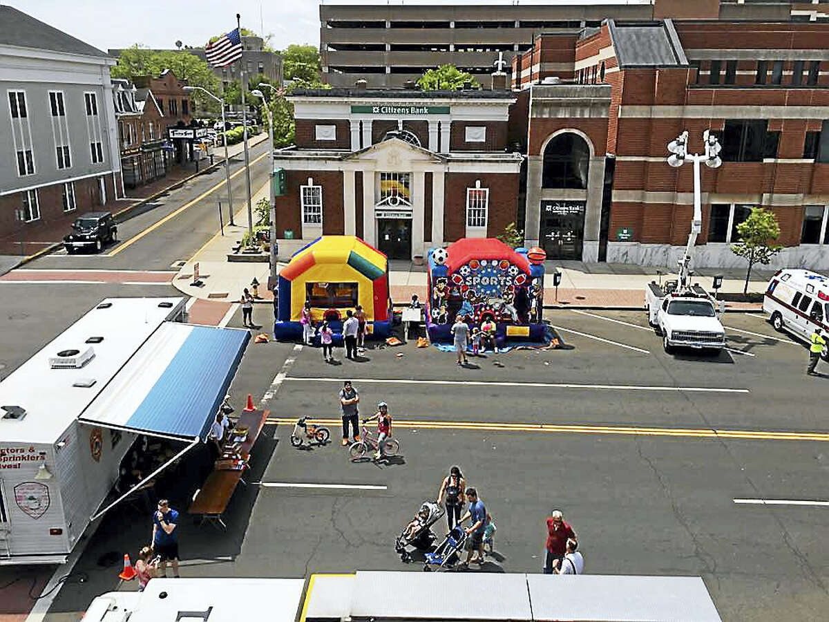 Children will have fun visiting informational booths, trying out police gear and crawling through the fire department smoke house trailer on Saturday.
