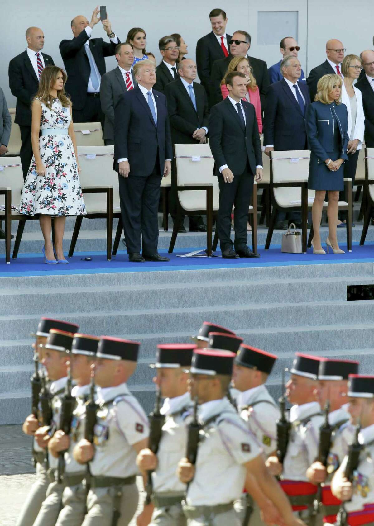 U.S. President Donald Trump: French President Emmanuel Macron, second from right; Macron’s wife, Brigitte, right, and U.S. first lady Melania Trump, left, applaud as they watch the traditional Bastille Day military parade on the Champs Elysees, in Paris, Friday, July 14, 2017.