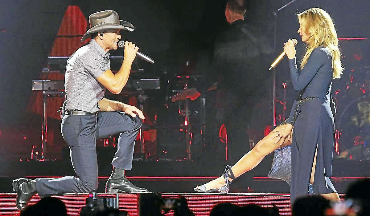 Country music stars Tim McGraw and Faith Hill are shown singing to each other during the start of their concert at the Mohegan Sun Arena on May 5. The husband and wife team entertained the sold out crowd of fans with their Soul2Soul Concert Tour that stopped in Uncasville. To learn more about all upcoming entertainment at the Mohegan Sun Casino, go to www.mohegansun.com.