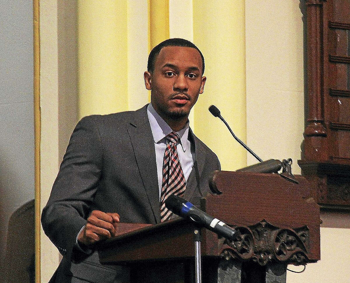 Trey James, a 2008 winner of the Martin Luther King Jr. Scholarship, speaks Monday at South Congregational Church during the 24th annual Martin Luther King Jr. birthday celebration in Middletown.