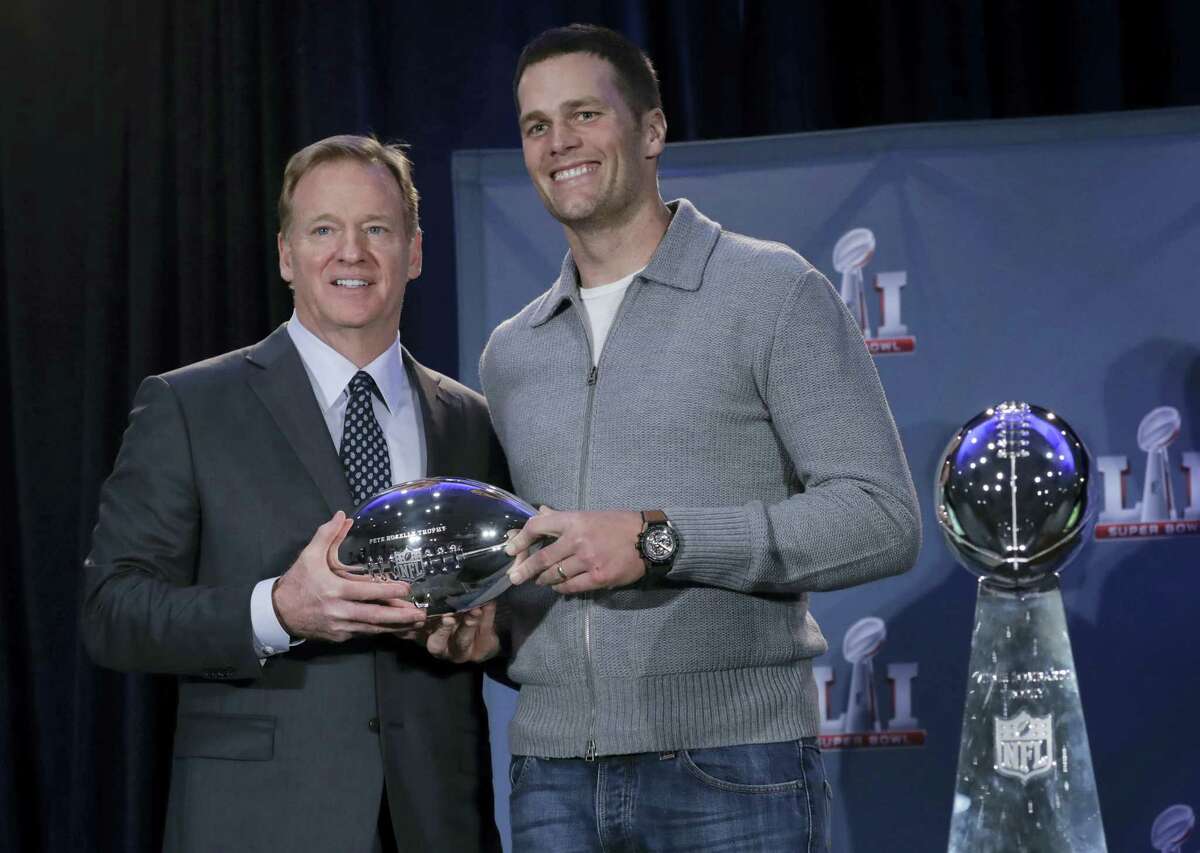 NFL commissioner Roger Goodell and Patriots quarterback Tom Brady pose during a news conference on Monday.