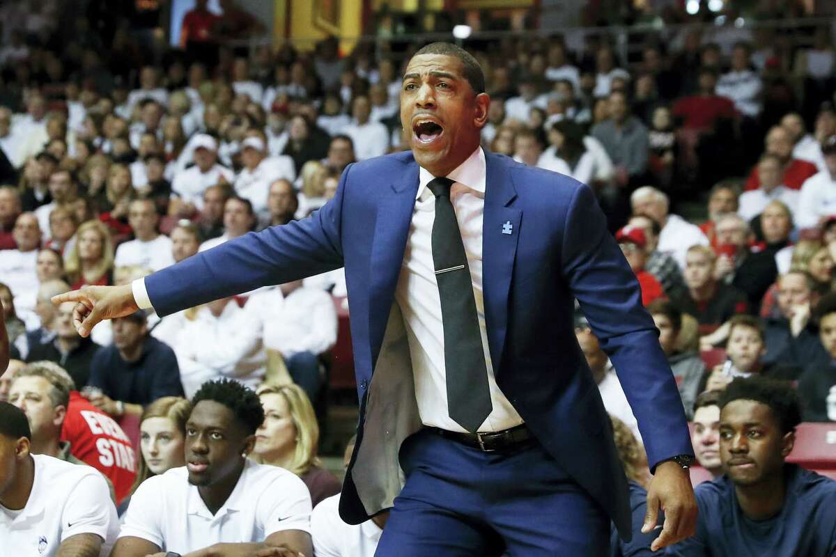 UConn coach Kevin Ollie directs his players from the bench on Saturday.