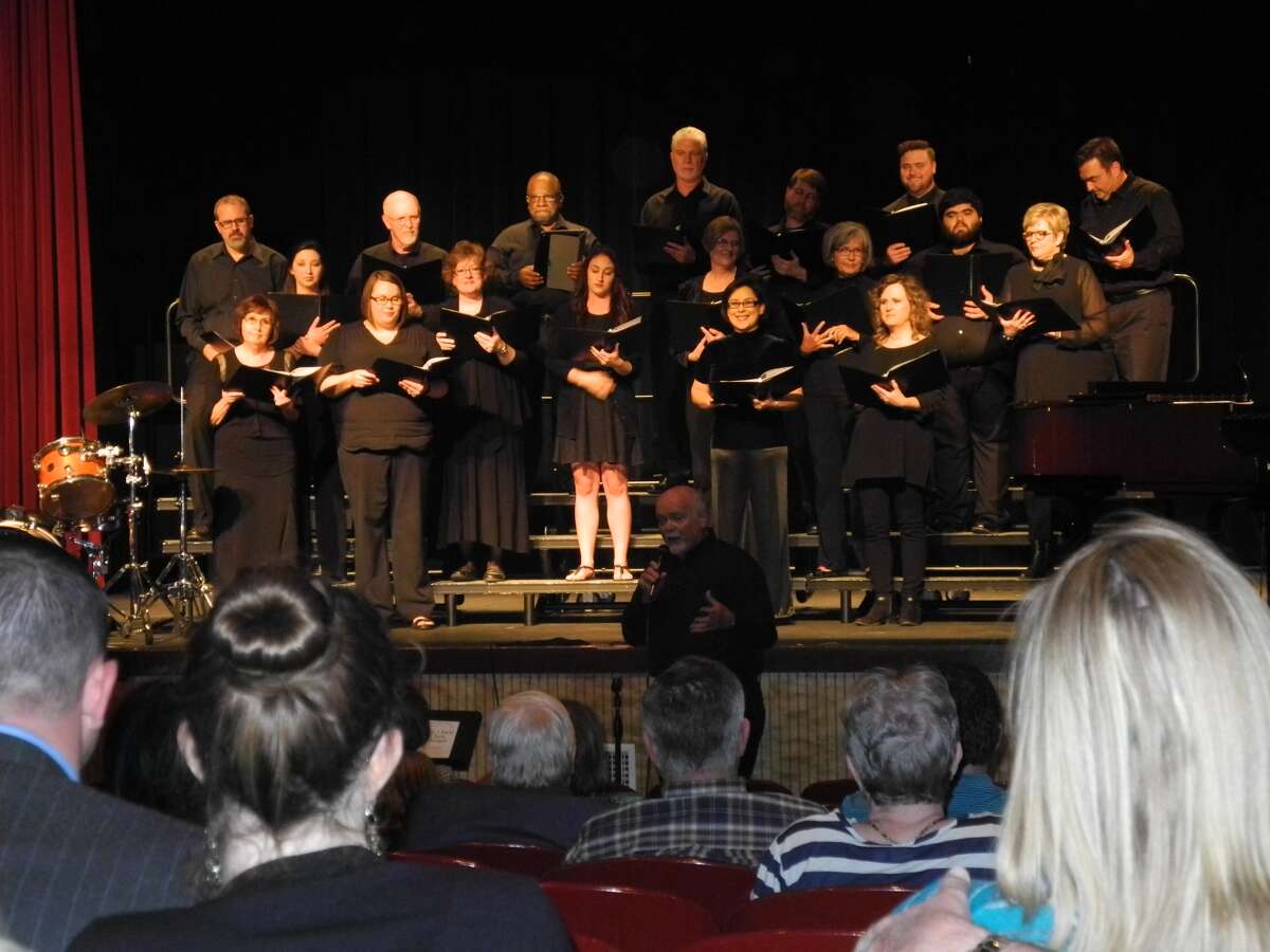 Walter Wright directs the Plainview Chorale in its debut performance at the Fair Theatre last spring.